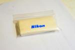 Nikon feliratú szemüveg és objektív törlő